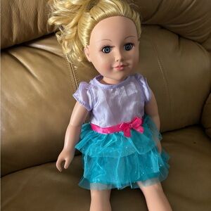 American Girl Doll with Purple Top and Teal Skirt